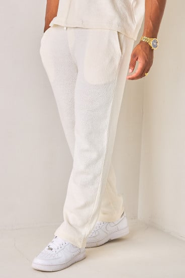 Pantalon coupe droite blanc en tissu texturé et ajouré